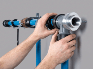 compressed air pipe being assembled. change the angle of the referenc 727374 (Large) Compressed air pipe assembly illustrating Aluminum Air Pipe system installation.